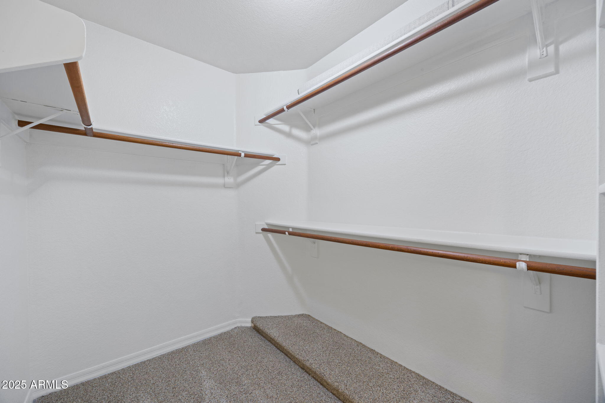 5104 North 32nd Street, Unit 344 Phoenix, AZ 85018 - Photo 21 of 30 a view of small space with racks on the wall