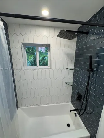 a bathroom with a bathtub