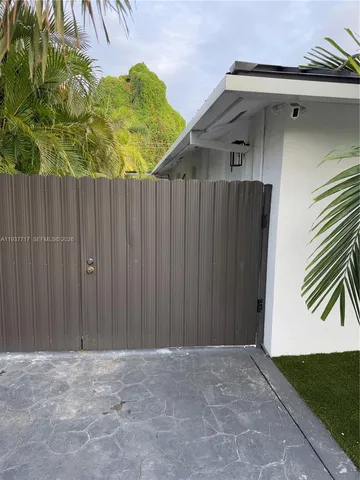 a view of outdoor space and wooden deck