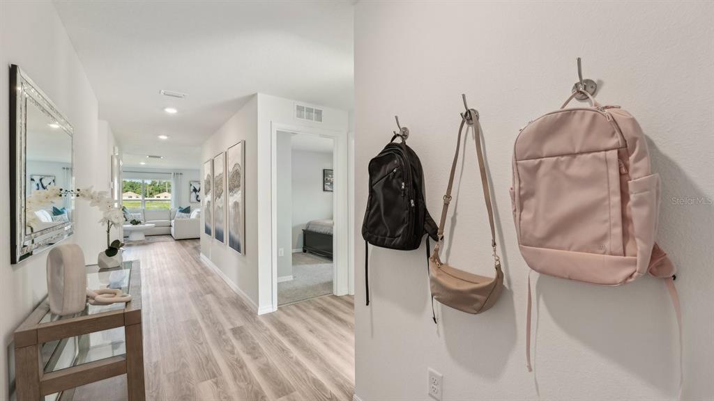 15898 Southeast 101st Ct Road Summerfield, FL 34491 - Photo 2 of 29 a view of a living room and a room with wooden floor
