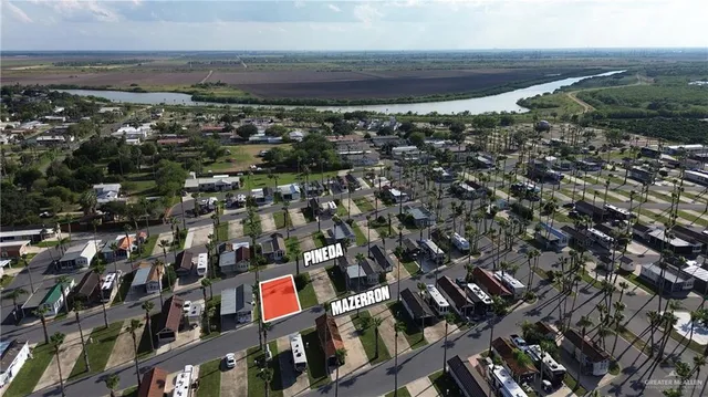 a view of multiple houses with city view