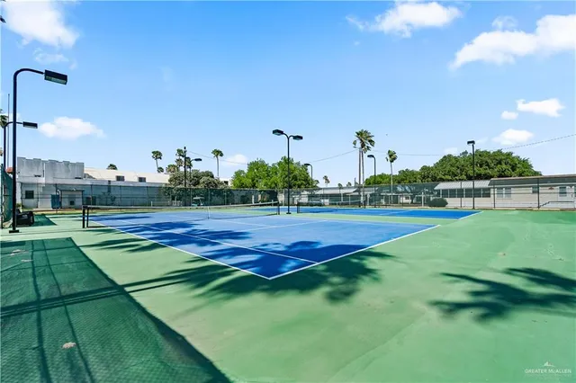 a view of a golf course with a lake