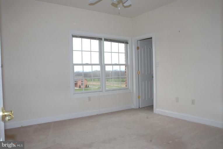 13678 Clear Spring Road Clear Spring, MD 21722 - Photo 11 of 28 an empty room with windows