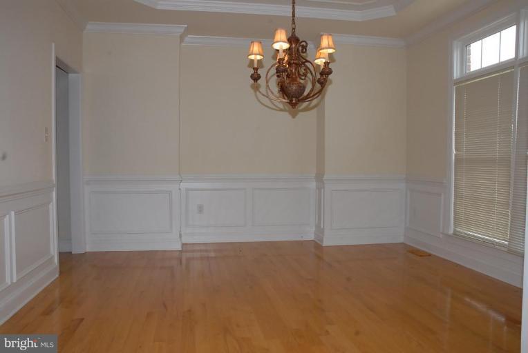 13678 Clear Spring Road Clear Spring, MD 21722 - Photo 15 of 28 an empty room with chandelier
