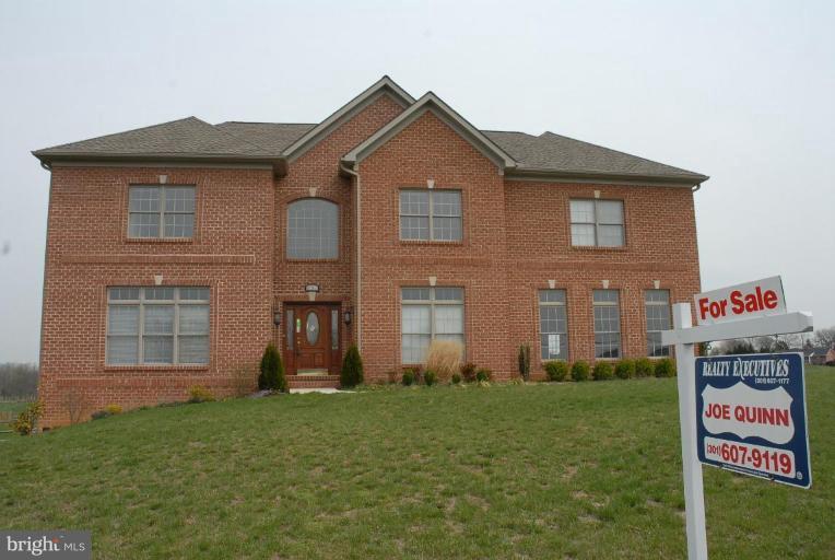 13678 Clear Spring Road Clear Spring, MD 21722 - Photo 25 of 28 a front view of a house with a yard