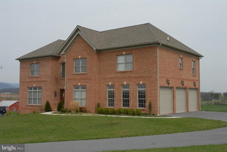 13678 Clear Spring Road Clear Spring, MD 21722 - Photo 26 of 28 a front view of a house with a yard