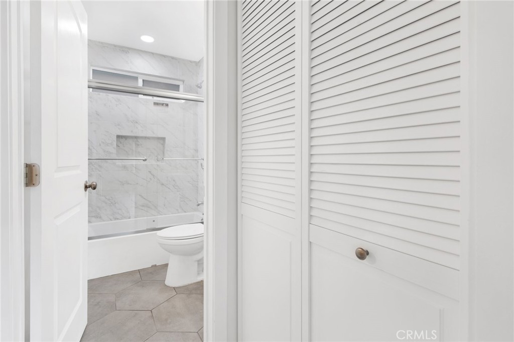 12540 Dexter Park Road Sylmar, CA 91342 - Photo 19 of 31 a bathroom with a toilet and a shower