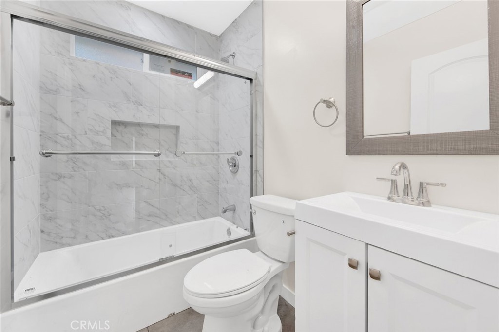 12540 Dexter Park Road Sylmar, CA 91342 - Photo 20 of 31 a bathroom with a sink toilet and shower
