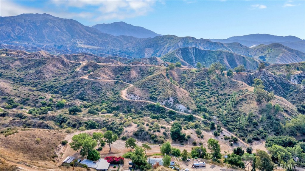 12540 Dexter Park Road Sylmar, CA 91342 - Photo 28 of 31 a view of a house with a mountain and a forest