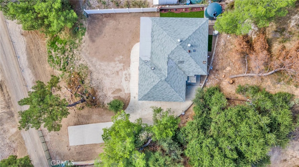 12540 Dexter Park Road Sylmar, CA 91342 - Photo 30 of 31 an aerial view of a house with a yard and trees all around