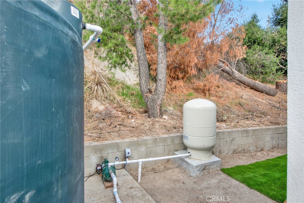 12540 Dexter Park Road Sylmar, CA 91342 - Photo 6 of 31 a backyard of a house with table and chairs