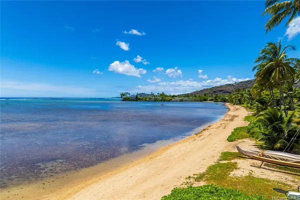 a view of a lake with a sunset