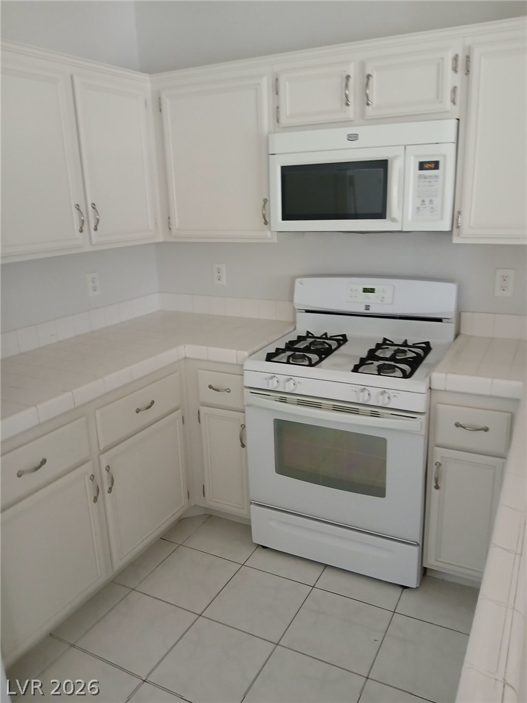 2201 Ramsgate Drive, Unit 426 Henderson, NV 89074 - Photo 5 of 22 This bright kitchen offers a practical layout for daily living and entertaining.