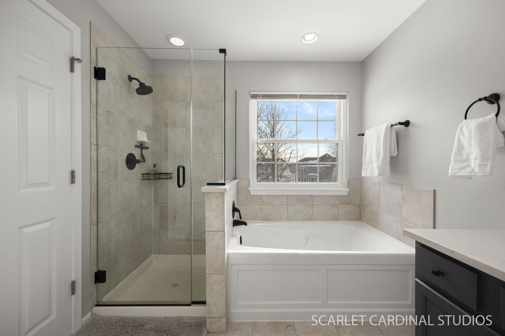 26115 Mapleview Drive Plainfield, IL 60585 - Photo 23 of 36 a bathroom with a bathtub a shower and a sink