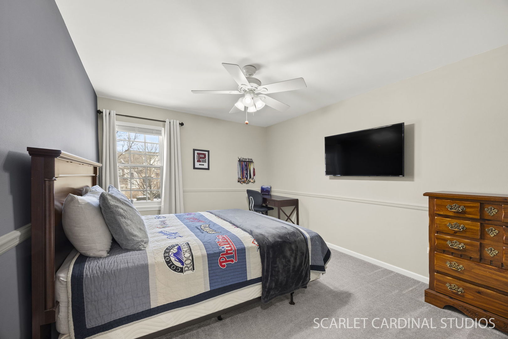 26115 Mapleview Drive Plainfield, IL 60585 - Photo 25 of 36 a bedroom with a bed and a flat screen tv