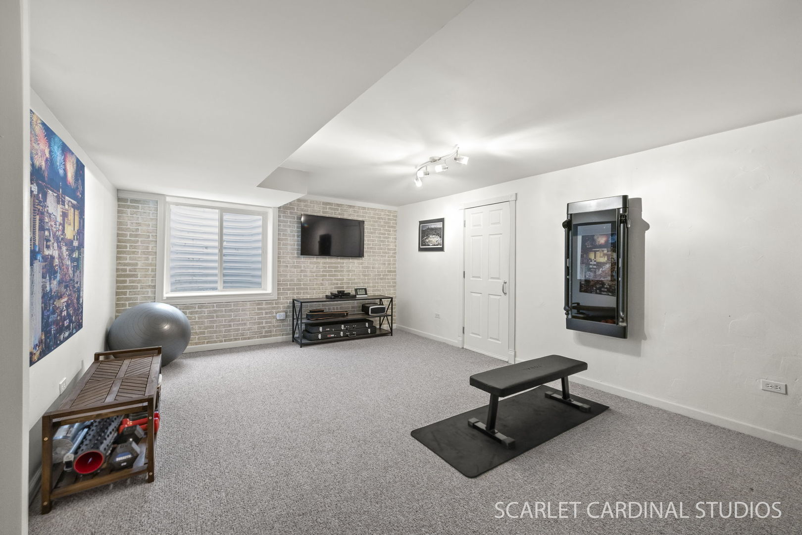 26115 Mapleview Drive Plainfield, IL 60585 - Photo 30 of 36 a living room with furniture and a flat screen tv