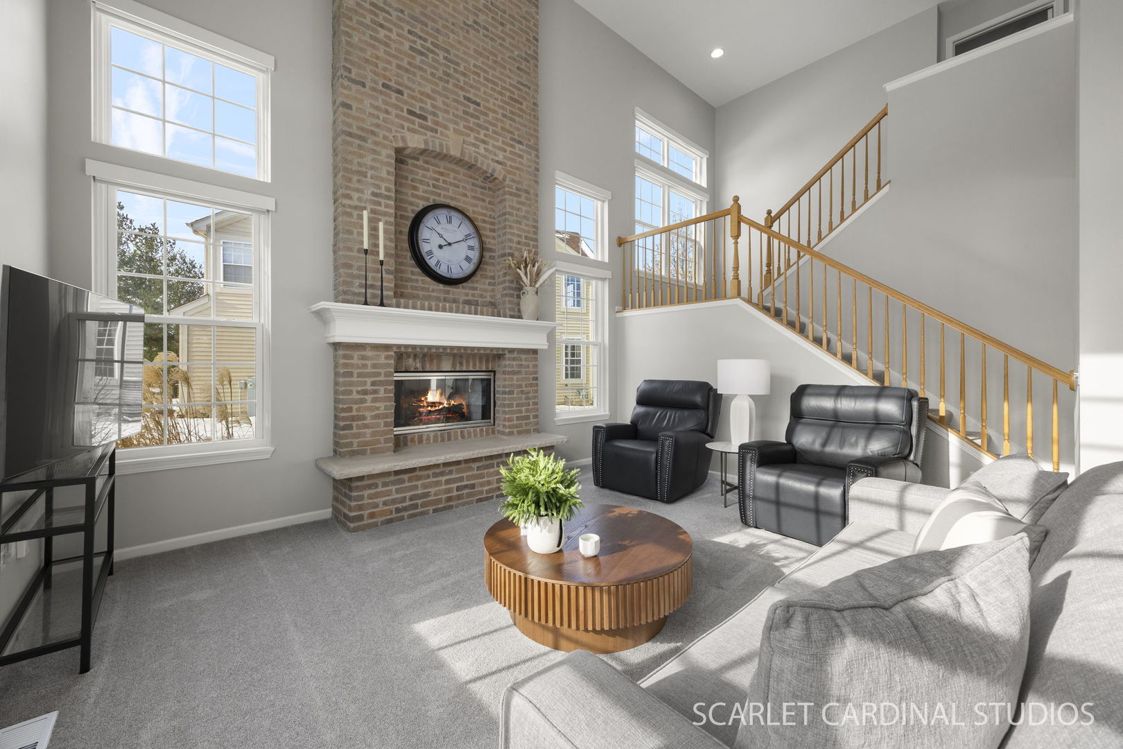 26115 Mapleview Drive Plainfield, IL 60585 - Photo 9 of 36 a living room with furniture a fireplace and a large window