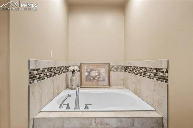 a bathroom with a bathtub