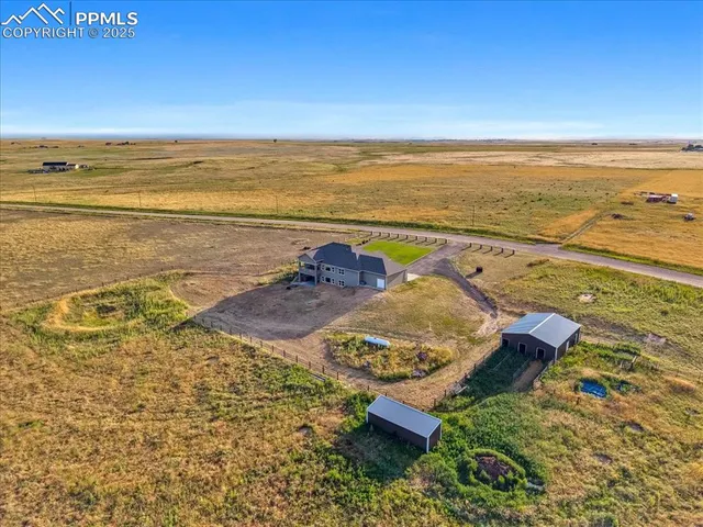a view of an ocean beach and city