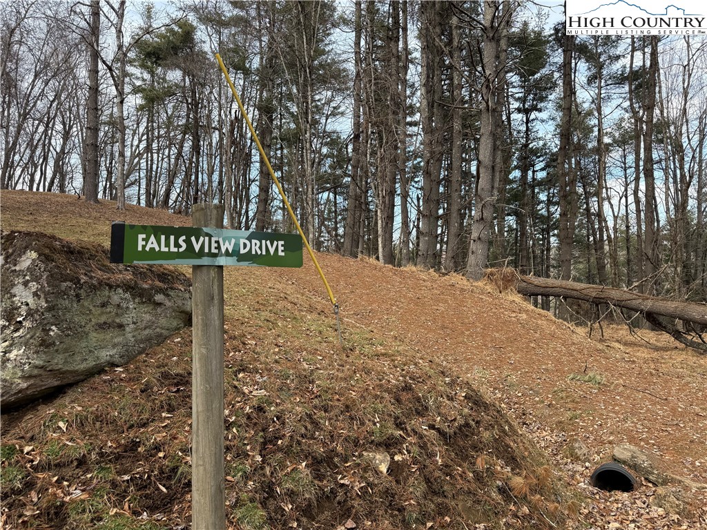Pritchard Road West Jefferson, NC 28694 - Photo 6 of 8 a street sign that is on a road