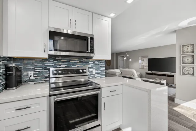 a view of balcony with furniture