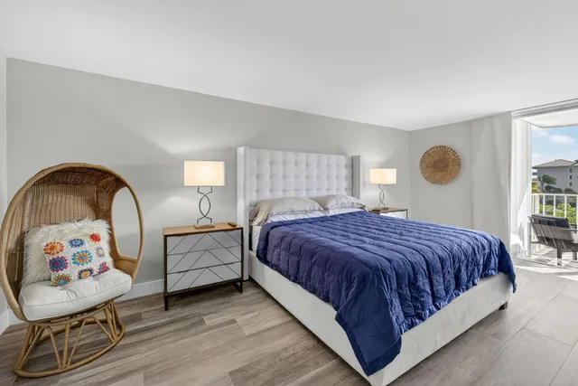 a spacious bathroom with a double vanity sink and a mirror