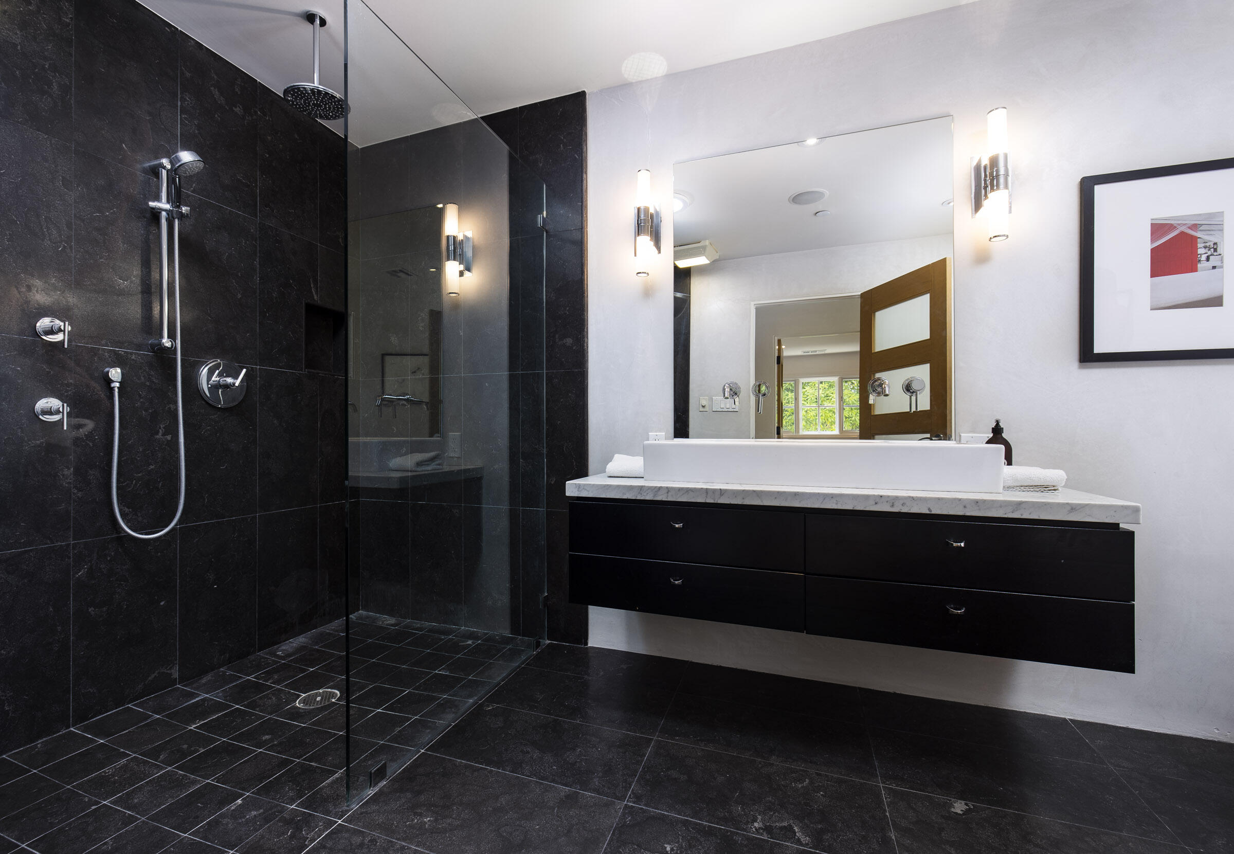 612 Cowles Road Montecito, CA 93108 - Photo 12 of 26 a bathroom with a sink vanity and a mirror