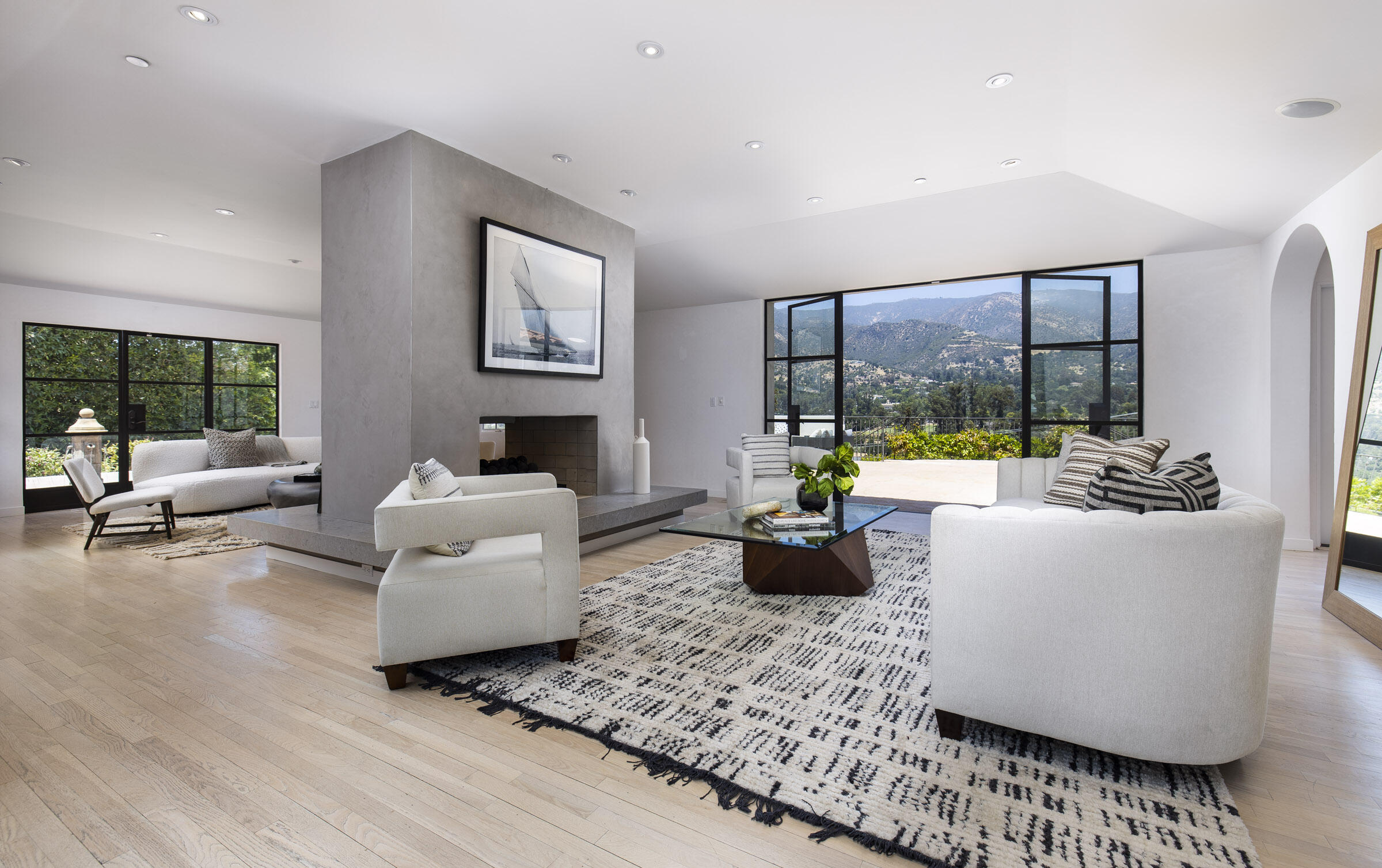 612 Cowles Road Montecito, CA 93108 - Photo 5 of 26 a living room with furniture large window and a table