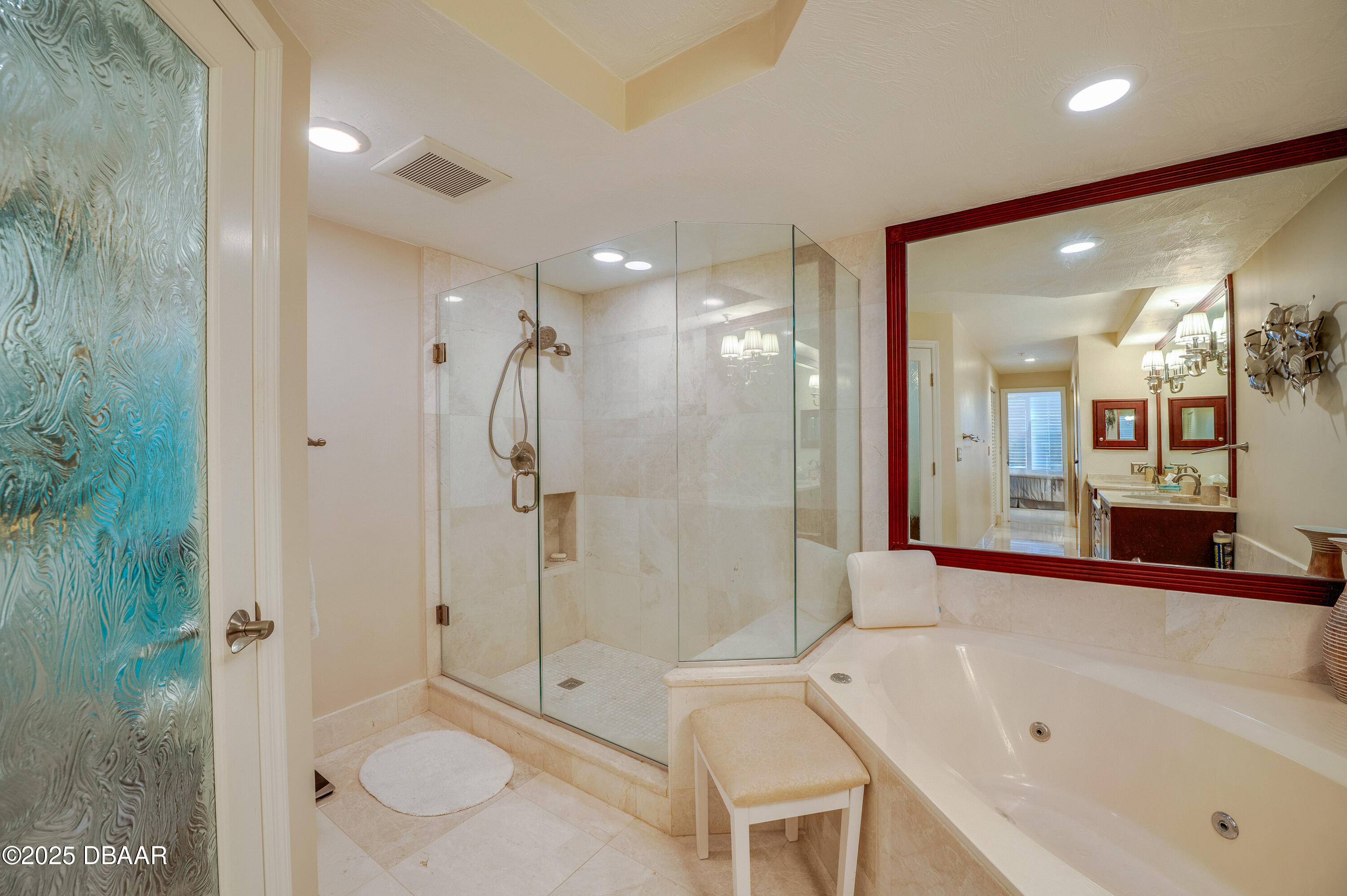 4525 South Atlantic Avenue, Unit 1704 Ponce Inlet, FL 32127 - Photo 23 of 45 a bathroom with a granite countertop sink a toilet and shower