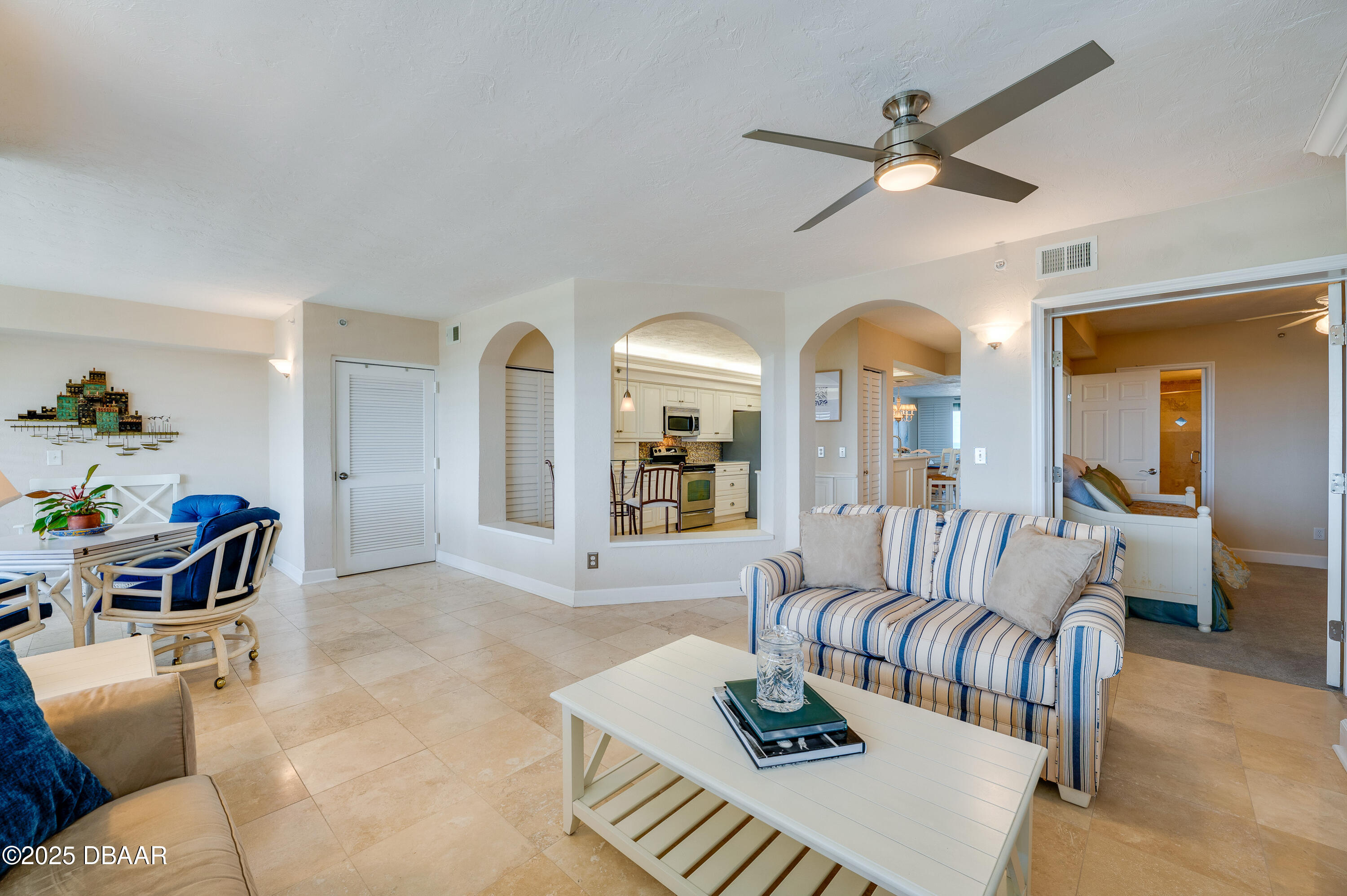 4525 South Atlantic Avenue, Unit 1704 Ponce Inlet, FL 32127 - Photo 7 of 45 a living room with furniture and wooden floor