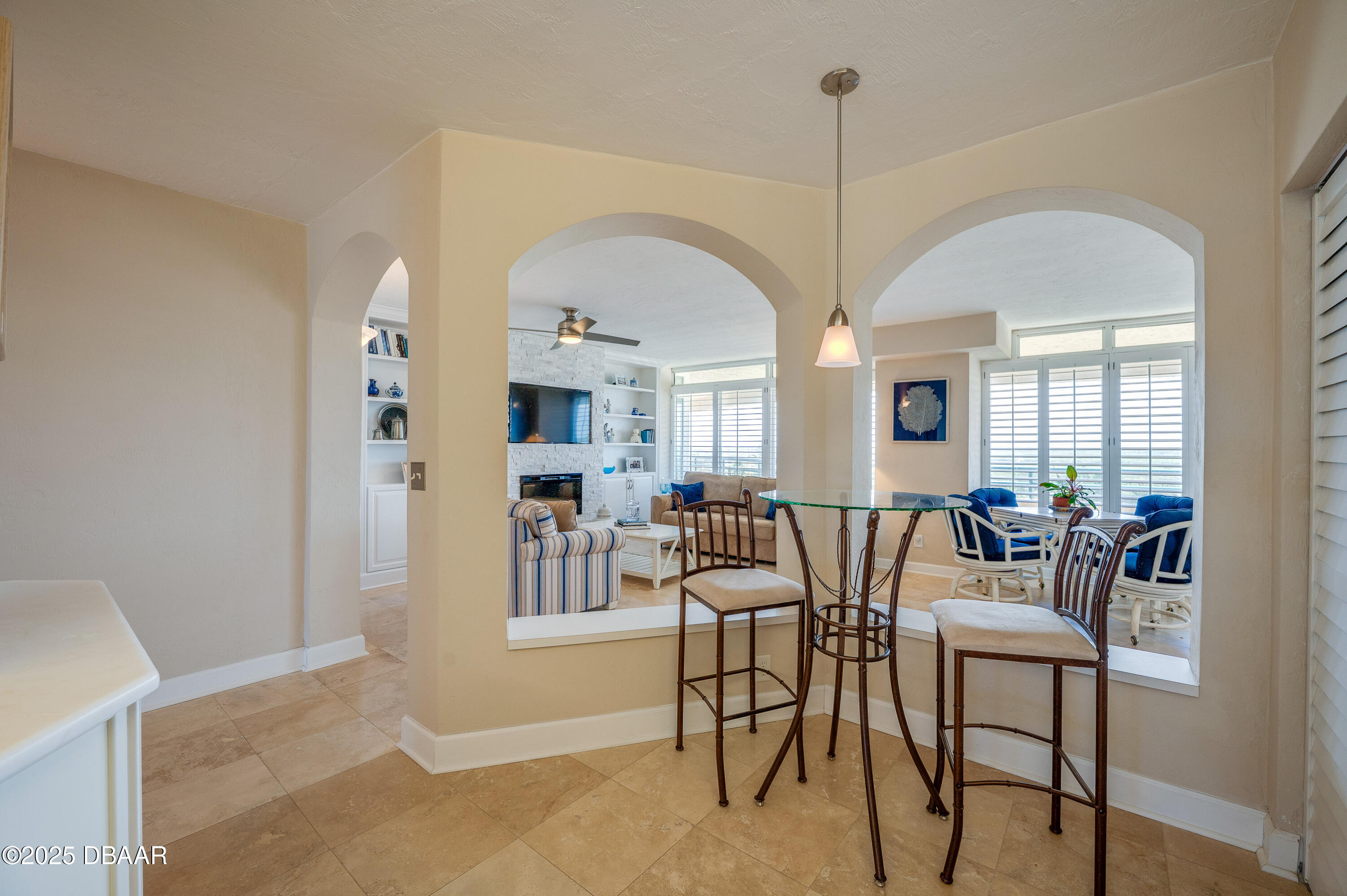 4525 South Atlantic Avenue, Unit 1704 Ponce Inlet, FL 32127 - Photo 10 of 45 a view of a dining room with furniture