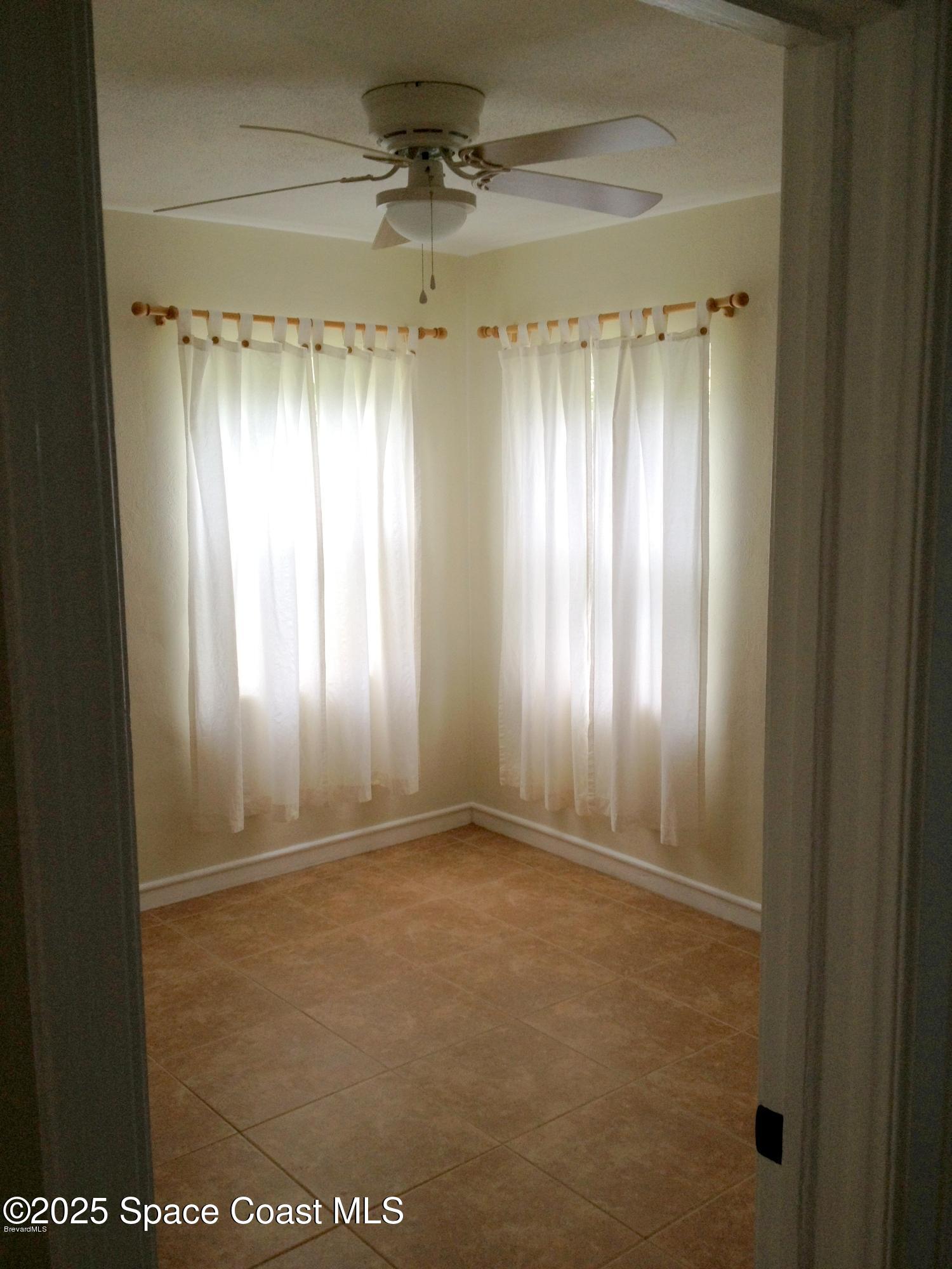151 Delmar Street Indialantic, FL 32903 - Photo 5 of 6 a view of entryway with window