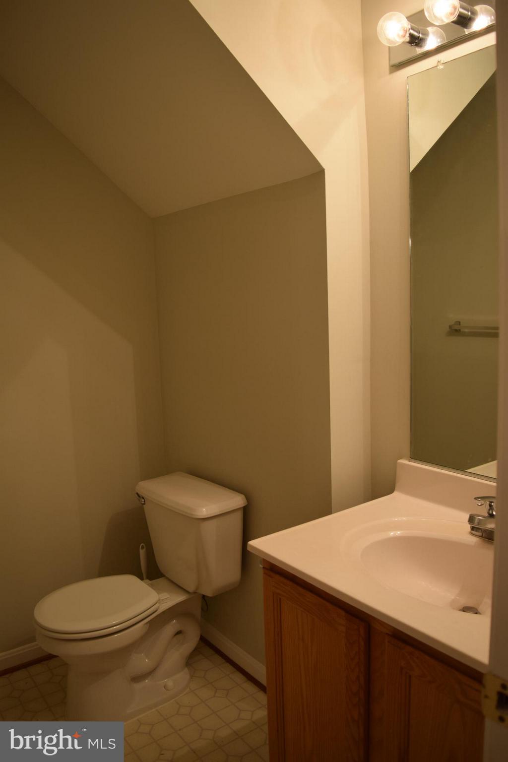 8738 Autumn Ridge Court Odenton, MD 21113 - Photo 12 of 25 Powder room on main level