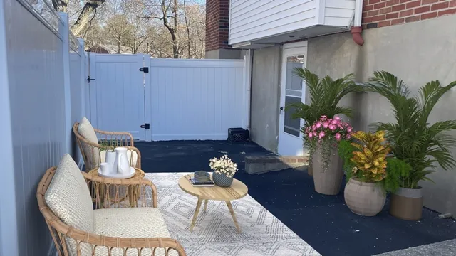 a view of a porch with furniture