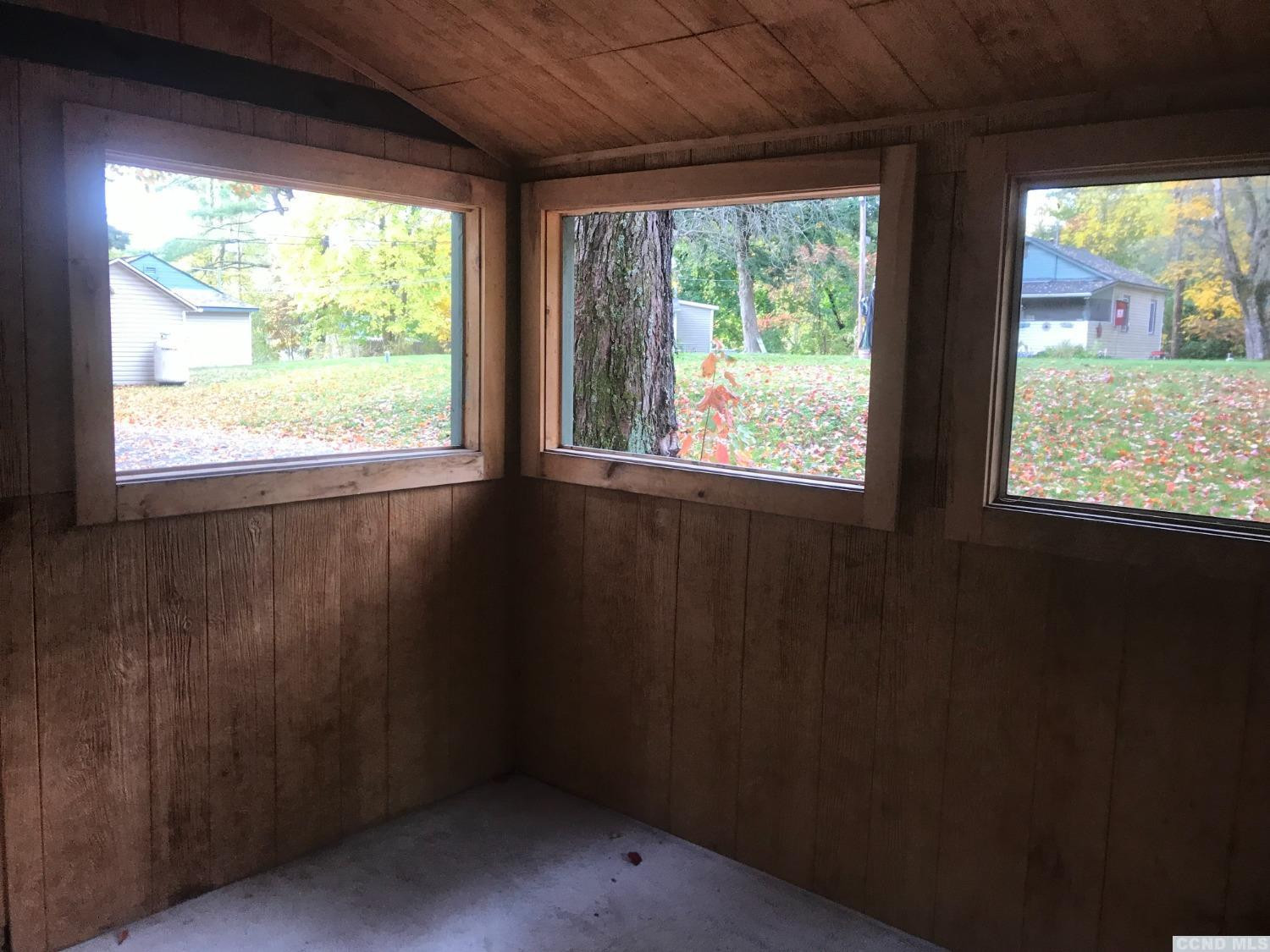 53 Lake Mills Road, Unit 11 Cairo, NY 12413 - Photo 6 of 6 a view of an empty room and a window