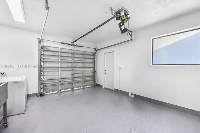 a utility room with cabinets