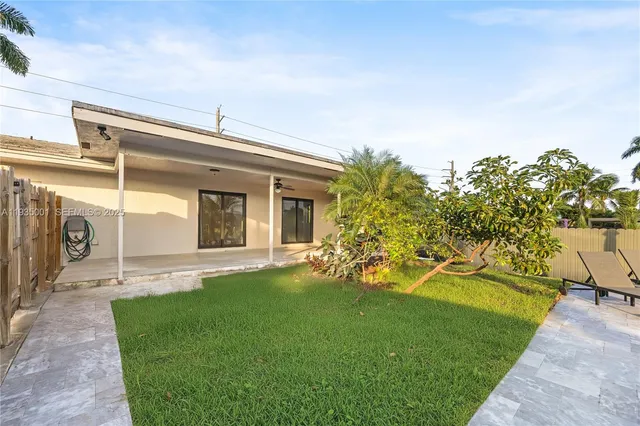 a view of a chairs and table on the terrace