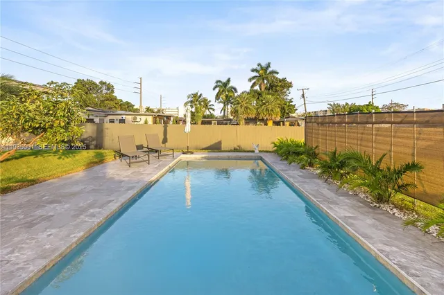 a house with garden in front of it