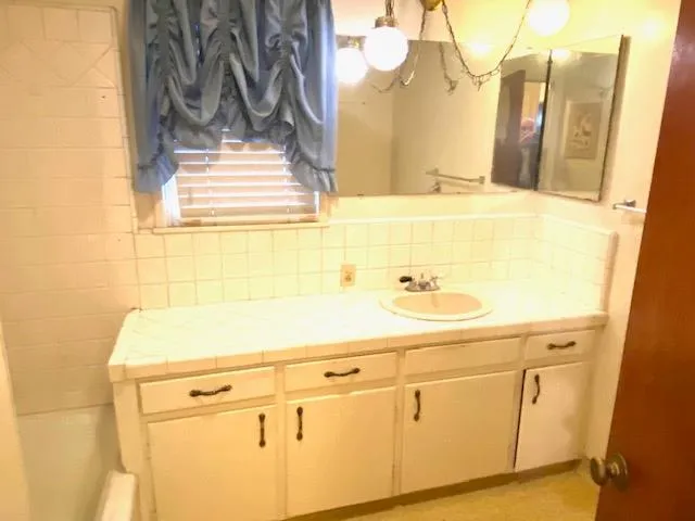 a close view of a sink and washer