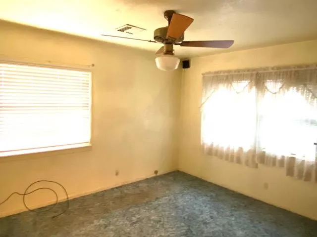 a view of a room and window