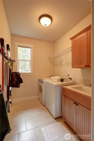 a view of a kitchen with a sink and dishwasher