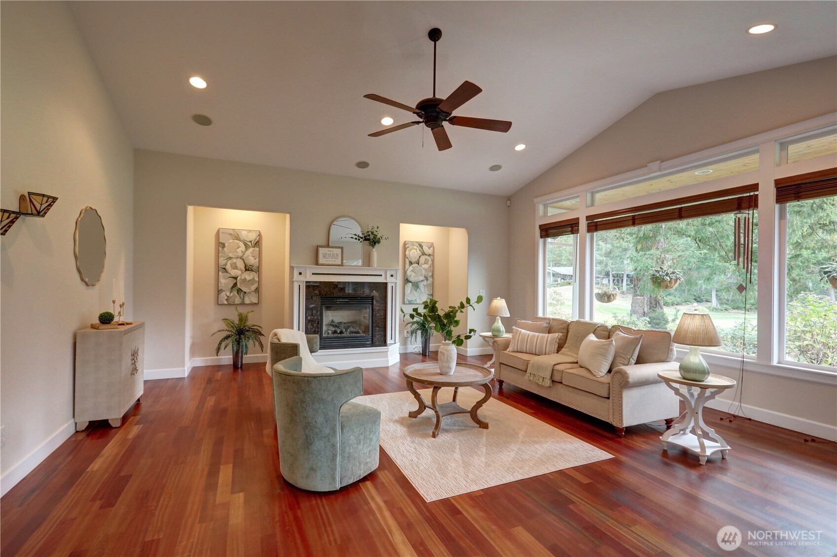 280 East Laurel Park Union, WA 98592 - Photo 9 of 39 a living room with furniture a fireplace and a floor to ceiling window
