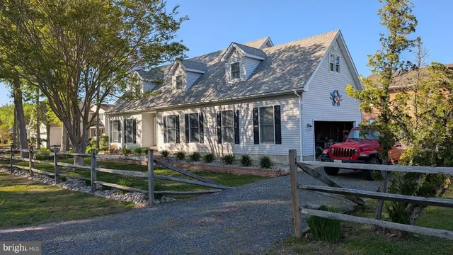 a front view of a house with porch
