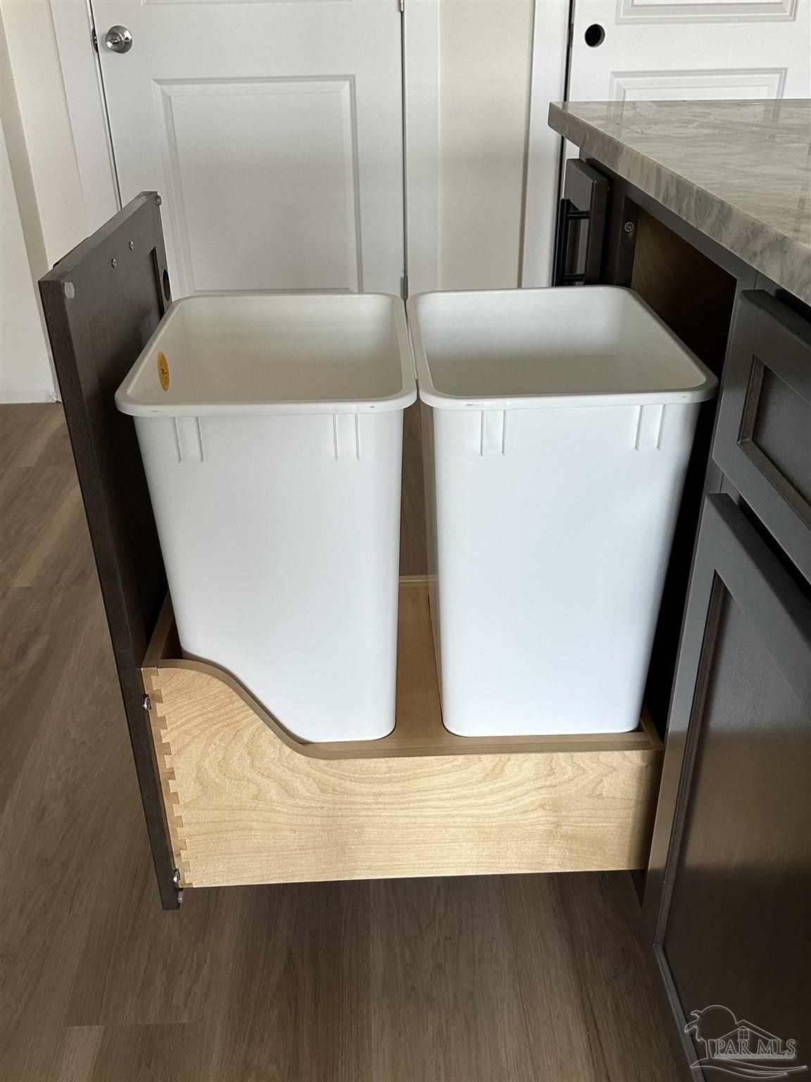 4954 Beck Avenue Jay, FL 32565 - Photo 6 of 9 a view of a room with wooden floor and staircase