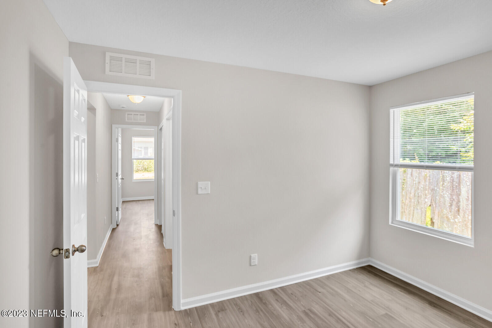 5639 Ricker Road Jacksonville, FL 32244 - Photo 21 of 26 wooden floor in a room