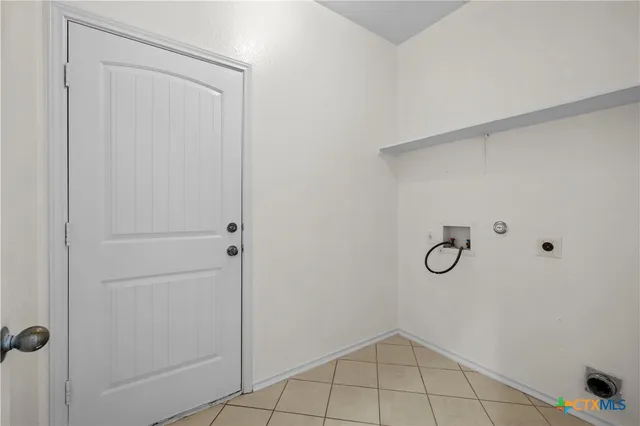 a view of a room with rack on the wall