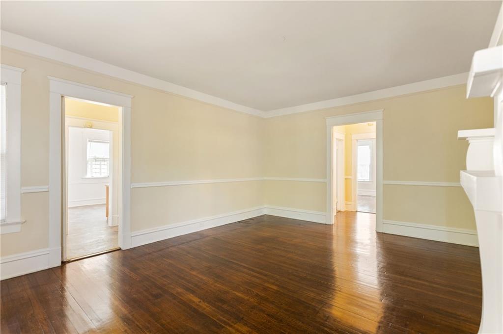 120 South Candler Street Decatur, GA 30030 - Photo 15 of 40 an empty room with wooden floor and windows