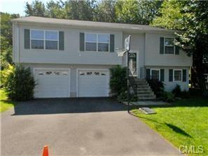 75 Edgemoor Road Bridgeport, CT 06606 - Photo 1 of 1 a front view of a house with garden