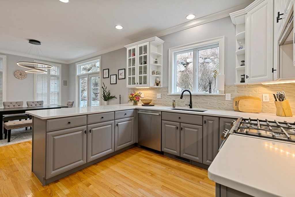 9 Chestnut Lane, Unit 9 Lexington, MA 02421 - Photo 5 of 32 a kitchen with sink cabinets and window