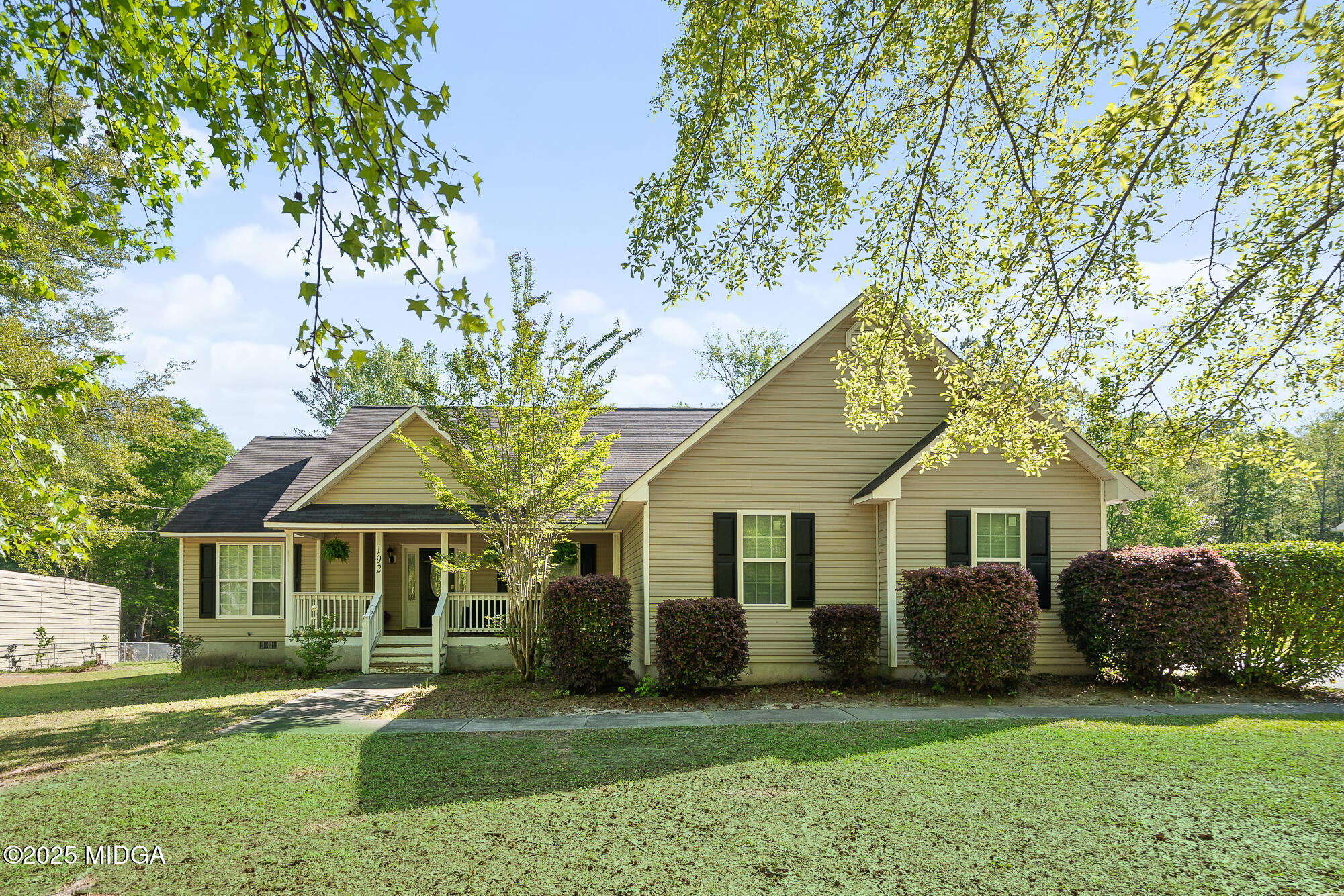 192 Whitaker Road Macon, GA 31211 - Photo 1 of 30 a front view of a house with a yard